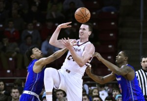 Dec 29, 2014; Chestnut Hill, MA, USA; Boston College Eagles guard Dennis Clifford (24) battles for the ball with UMass Lowell River Hawks guard Marco Banegas-Flores (13) defending during the first half of the game at Silvio O. Conte Forum. Mandatory Credit: Gregory J. Fisher-USA TODAY Sports
