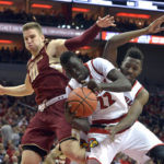 Cards Fly Higher than Eagles, Drop BC 90-67
