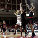 Bowman, BC Hold Off Louisville with Late Surge